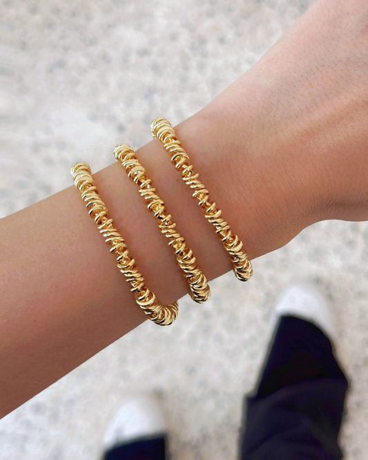 PULSERA DORADA ENTORCHADA