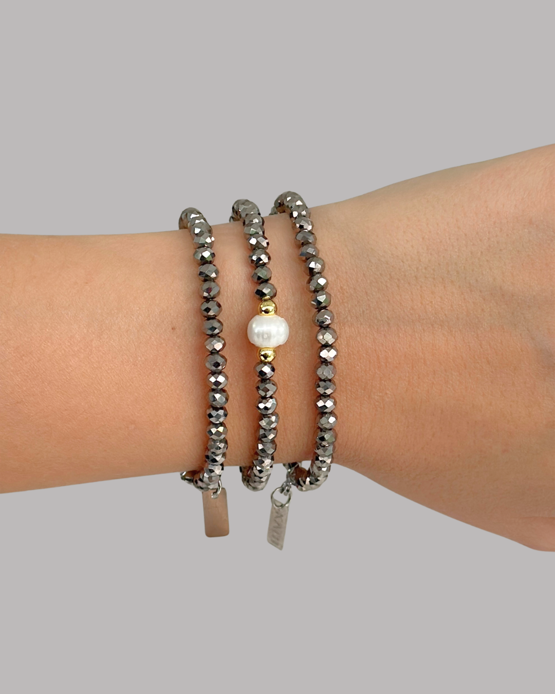 SET PULSERAS DE CRISTALES PLATEADOS Y PERLA
