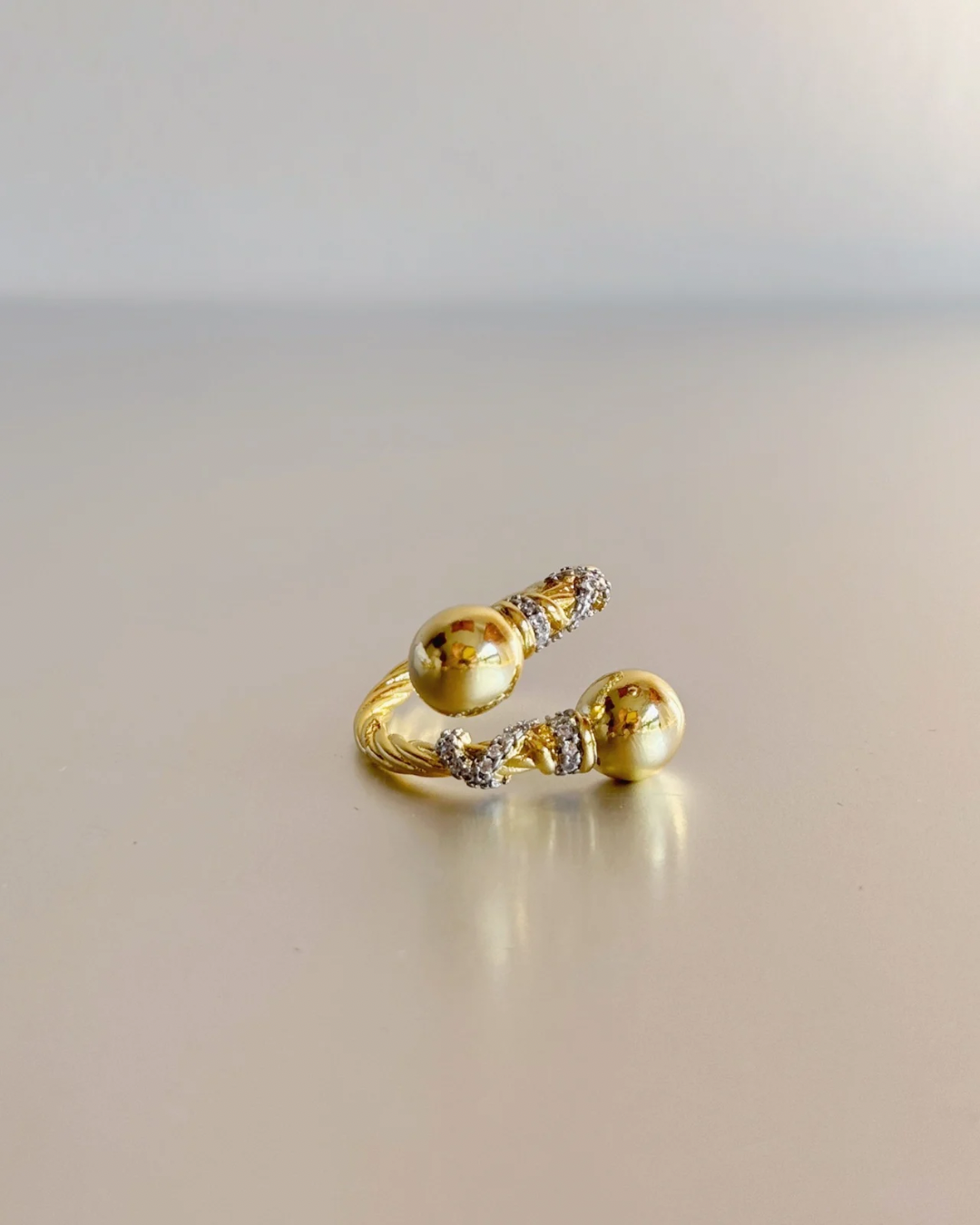 ANILLO DORADO DE BALINES
