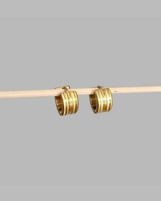 ARGOLLAS ACERO DORADAS LÍNEAS