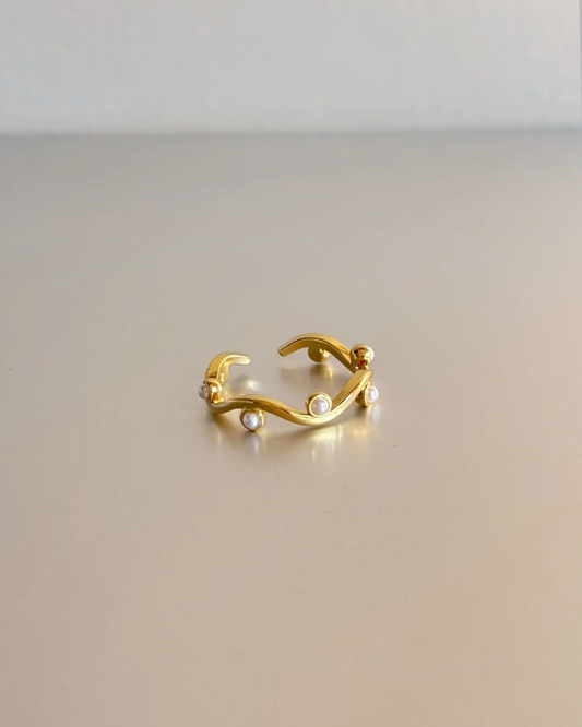 ANILLO DORADO ONDULADO PERLA